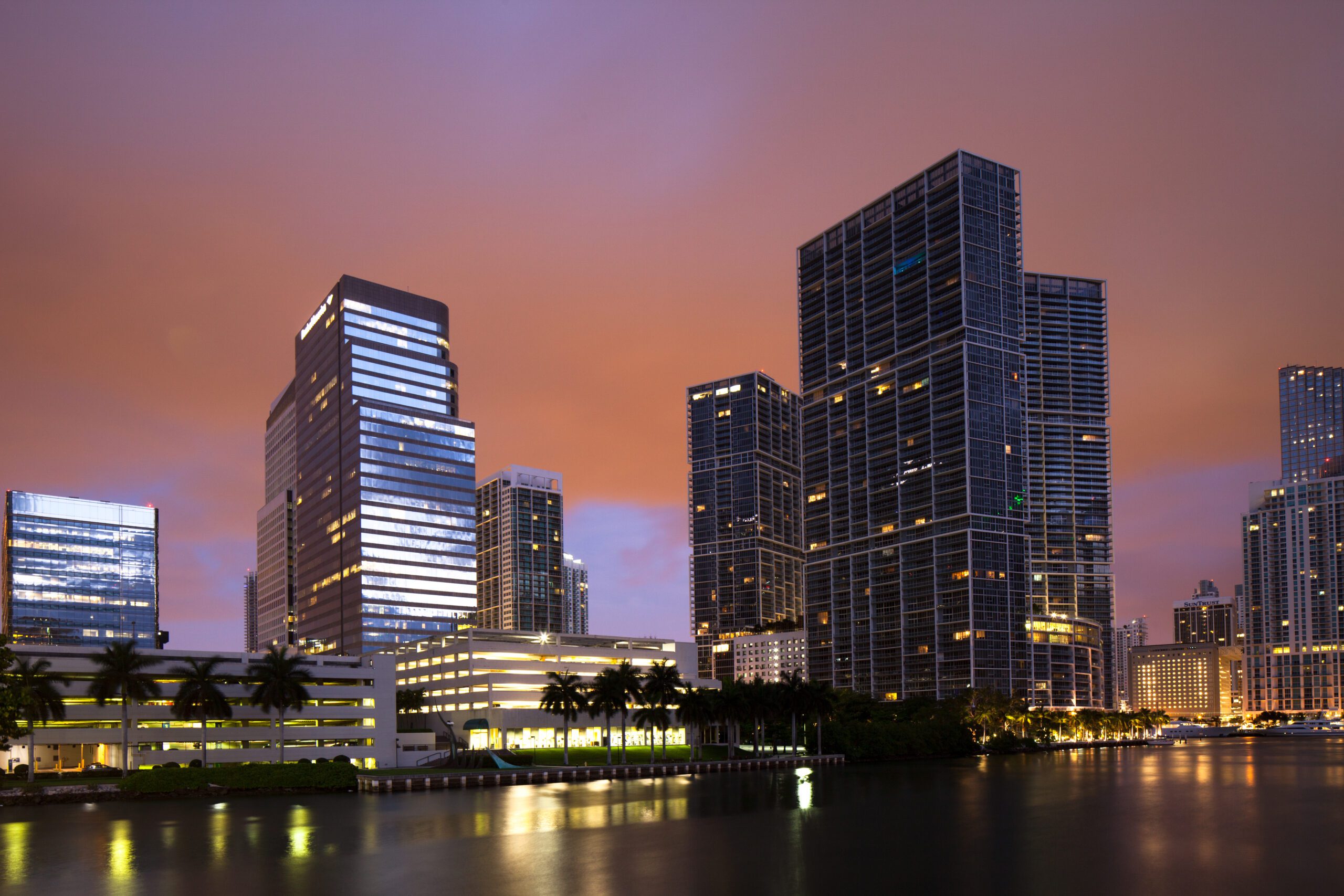 Brickell financial district skyline reflected in Biscayne Bay at dusk