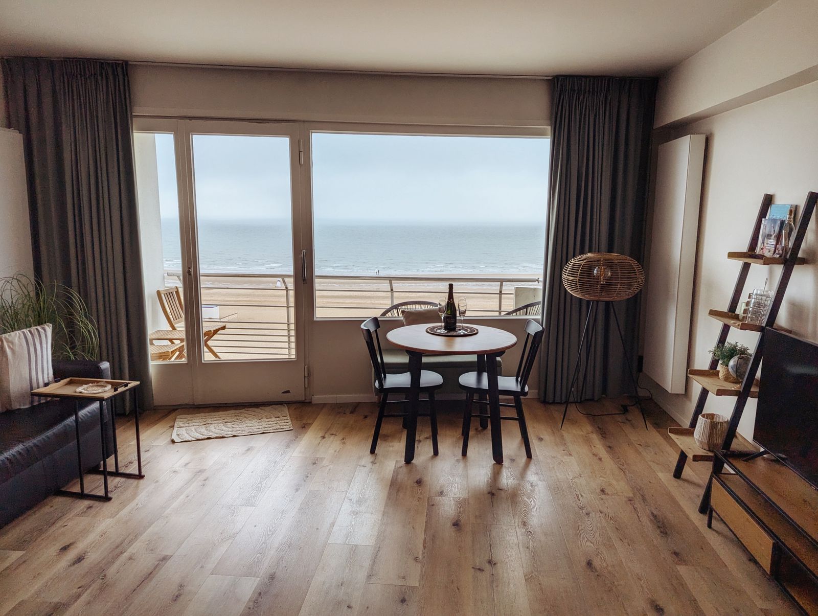 Living room of a beachfront suite with an ocean view